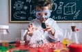 Happy kid making experiments with soap foam Royalty Free Stock Photo