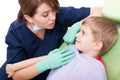 Happy kid patient with mother dentist doctor Royalty Free Stock Photo