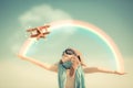 Happy kid playing with toy airplane Royalty Free Stock Photo