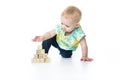 Happy kid playing toy blocks isolated on white background Royalty Free Stock Photo