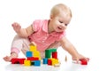 Happy kid playing toy blocks on white Royalty Free Stock Photo