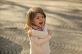 Happy kid smile with hug hand gesture on sunny day Royalty Free Stock Photo