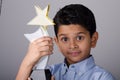 Happy kid or student with award. Royalty Free Stock Photo