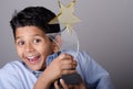 Happy kid or student with award. Royalty Free Stock Photo