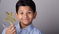 Happy kid or student with award. Royalty Free Stock Photo