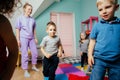 Happy kids actively playing at the daycare