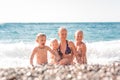 Happy kids on the beach having fun