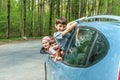 Happy kids in car, family trip, summer vacation travel Royalty Free Stock Photo