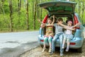 Happy kids in car, family trip, summer vacation travel Royalty Free Stock Photo