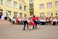 Ukraine Kiev May 2019. Graduates of elementary school. Beautiful children dance in the open school yard, at the last bell festival