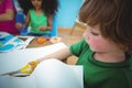 Happy kids doing arts and crafts together Royalty Free Stock Photo