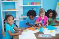 Happy kids doing arts and crafts together Royalty Free Stock Photo