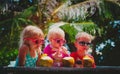 Happy kids drinking coconut cocktail on beach resort Royalty Free Stock Photo