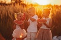 Happy kids eating watermelon. Kids eat fruit outdoors. Healthy snack for children. Little girls and boy playing in the garden Royalty Free Stock Photo