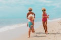 Happy kids enjoy beach vacation, boy and girls have fun Royalty Free Stock Photo