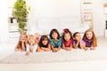 Happy kids on the floor Royalty Free Stock Photo