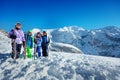 Happy kids group stand with mountain ski in hands Royalty Free Stock Photo