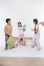 happy kids having pillow fight while Royalty Free Stock Photo