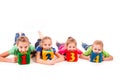 Happy kids holding blocks with numbers over white background Royalty Free Stock Photo