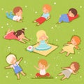 Happy Kids Lying Down on Green Lawn Set, Cute Boys and Girls Having Fun Outdoors Cartoon Vector Illustration Royalty Free Stock Photo