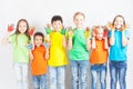 Happy kids with painted hands smiling Royalty Free Stock Photo