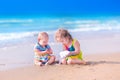 Happy kids playing on the beach Royalty Free Stock Photo