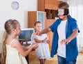 Happy kids playing with blindfold