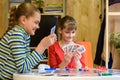 Happy kids playing board games Royalty Free Stock Photo