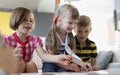 Happy kids playing card game at home, children party, birthday celebration Royalty Free Stock Photo