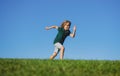 Happy kids playing and running on grass outdoors in summer park. Active kids healthy outdoor. Fun activity. Royalty Free Stock Photo