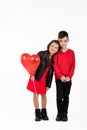 Happy kids with red heart balloon Royalty Free Stock Photo