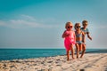 Happy kids running on beach, boy and girls have fun at sea Royalty Free Stock Photo