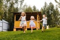 Happy kids running in garden on grass. Royalty Free Stock Photo