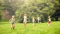 Happy kids running and playing game outdoors Royalty Free Stock Photo