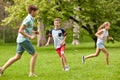 Happy kids running and playing game outdoors Royalty Free Stock Photo