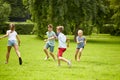 Happy kids running and playing game outdoors Royalty Free Stock Photo