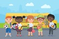 Happy kids stand on road in front of school bus, children passengers go for knowledge Royalty Free Stock Photo