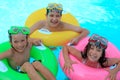 Happy kids in swimming pool