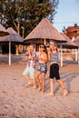 Happy kids walking along a sandy beach Royalty Free Stock Photo