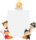 Happy Kids Wearing Halloween Costume with a blank sign Royalty Free Stock Photo