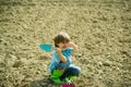 Happy kids work plant and water in green spring garden. Eco life. Child Farmer planting in the vegetable garden. Royalty Free Stock Photo