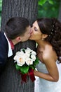 Happy kiss bride and groom