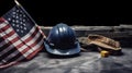 Happy Labor day concept. American flag with different construction tools on dark stone background, with copy space for text. Royalty Free Stock Photo