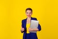 Happy with laptop. Closeup portrait college student looking smiling holding pad tablet computer showing thumbs up gesture with Royalty Free Stock Photo