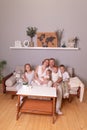 Happy large family together on the couch at home. parents and children Royalty Free Stock Photo