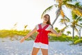 Happy latin beautiful girl in caribbean beach Royalty Free Stock Photo