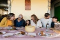 Happy Latin family having fun lunching at home Royalty Free Stock Photo