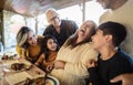 Happy Latin family having fun lunching together at home Royalty Free Stock Photo