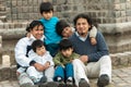 Latin family sitting in the street Royalty Free Stock Photo