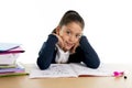 Happy latin little school girl with notepad smiling in back to school and education concept Royalty Free Stock Photo